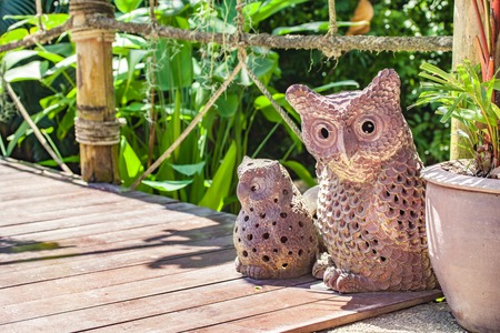 Owl ornament in the gardenの写真素材