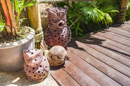 Owl ornament in the gardenの写真素材