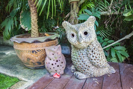 Owl ornament in the gardenの写真素材
