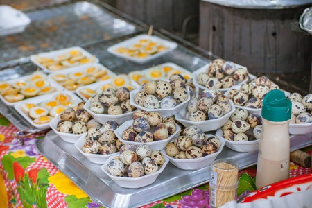 Quail eggs at the market on streetの写真素材