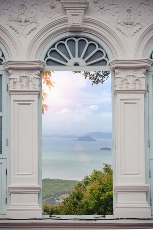Sino windows and views of the tropical seas at sunset.の写真素材
