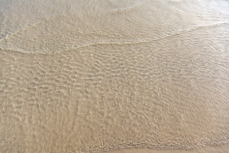 Close-up detail of the sea waves  at the beach.の写真素材