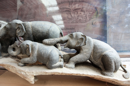 Old handcraft wood elephant sculptureの写真素材