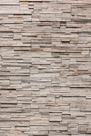 Brown stone wall pattern natural surfaceの写真素材