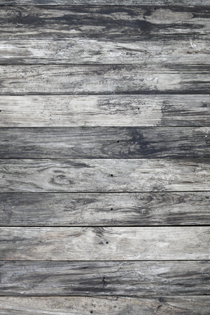 Grey wood texture with natural patterns backgroundの写真素材