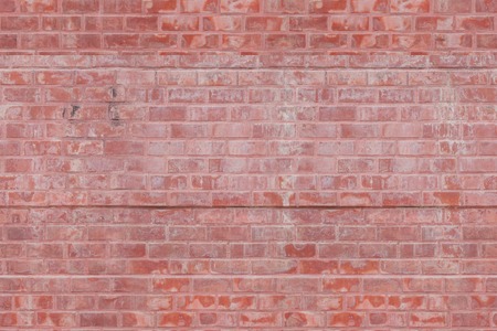 Weathered stained old brick wall background,textureの写真素材