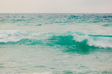 Close up sea wave in summer, Sunset at Surin beach, Phuket, Thailandの写真素材