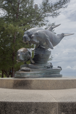 Trang, Thailand -  Statue Manatee Pak Meng Beach. It symbolizes the complete blockage of the sea.の写真素材