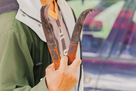 Close up the knife for banana branches at banana Marketの写真素材