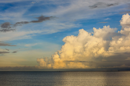 Colorful beautiful cloudy sunset sky on the seaの写真素材