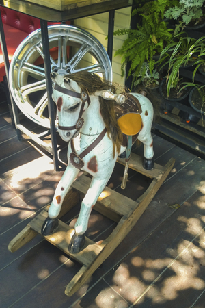 Wooden rocking horse on wooden floor,vintageの写真素材