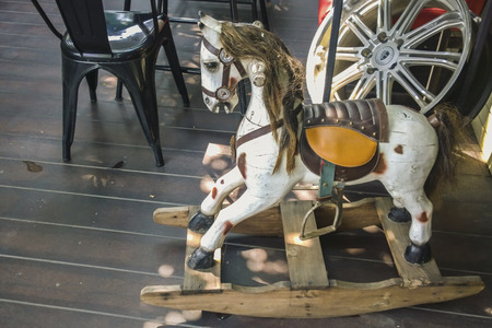 Wooden rocking horse on wooden floor,vintageの写真素材