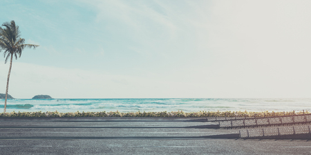 Abstract scene of road beside  beach and sea and blue sky with cloud  vintage style - 3d renderingの写真素材