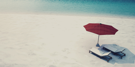 Beautiful Sea View Deck chairs on tropical beach at sunlight  - 3d renderingの写真素材