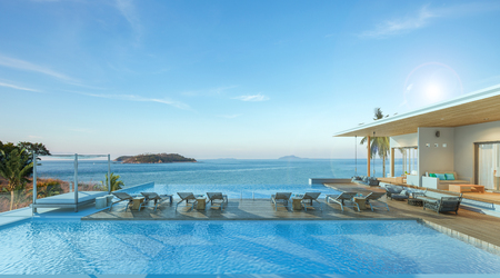 Sea view swimming pool in modern loft design,Luxury ocean Beach house, 3d renderingの写真素材