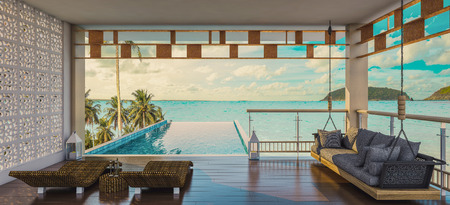 Terrace open doors overlooks to borderless swimming pool and sea view, 3d renderingの写真素材