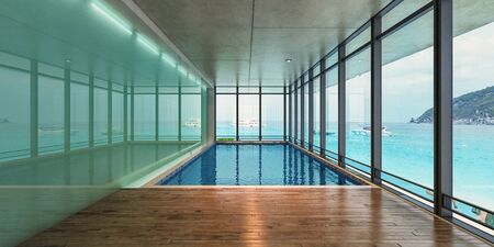 Sea view indoor swimming pool of a modern house at sunlight,3d renderingの写真素材