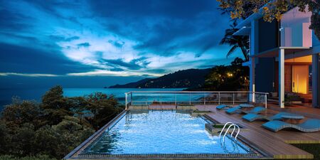 Sea view swimming pool in modern loft design,Luxury ocean Beach house,Night view  3d renderingの写真素材