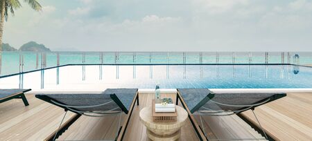 Beautiful view of Swimming Pool with  the sea at sunlight  - 3d renderingの写真素材