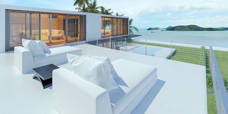 Beautiful view of Modern Sea House with  the sea, Lounge chairs on white floor deck at vacation home  - 3d renderの写真素材