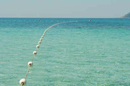 Beautiful tropical sunset scenery, sea view with horizon,calmness and relaxation.の写真素材