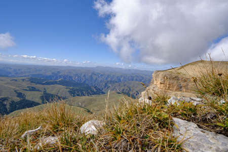 Mountain peak goes into the sky and cloudsの写真素材