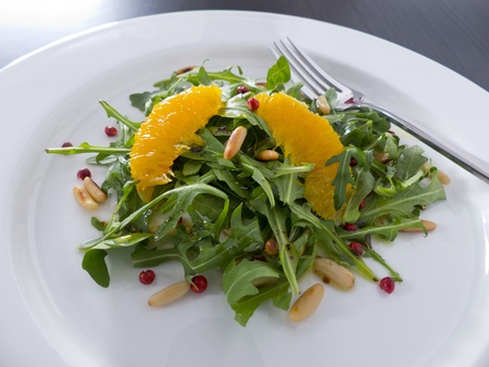 Rocket salad with orange, pepper and pine nuts
の写真素材