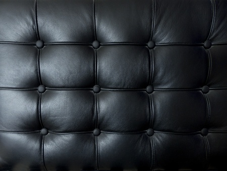 Fund in black leather with studs 