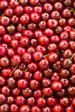 Many cherries on a market stall.の写真素材