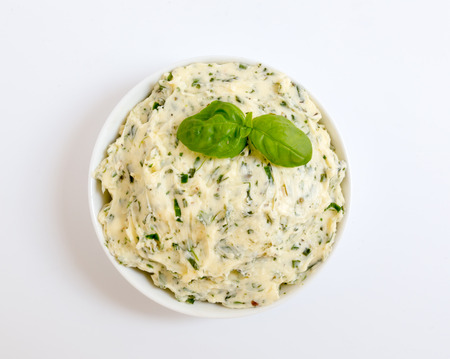 Herb butter in a bowl as a Cut.の写真素材