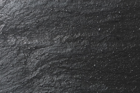 Glossy black slate background or texture.の写真素材
