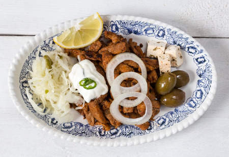 Gyros with Tzatziki Coleslaw olives and feta cheese.の写真素材