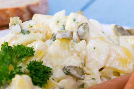 Potato salad with sausage and mustard.の写真素材