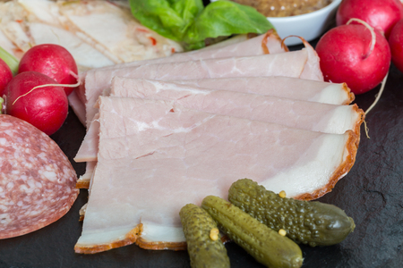 Sausage plate variation on a wooden table.の写真素材