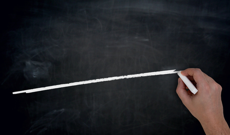 Hand writes on blackboard concept.の写真素材