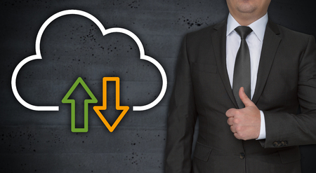 Data cloud concept and businessman with thumbs up.の写真素材