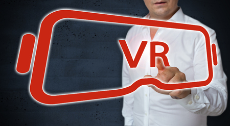 Virtual reality glasses touchscreen is operated by man concept.の写真素材