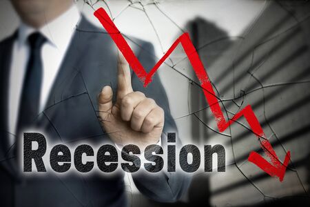 Recession concept is shown by businessman.の写真素材