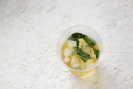 homemade lemonade with lemon and mint on a hot summer morning