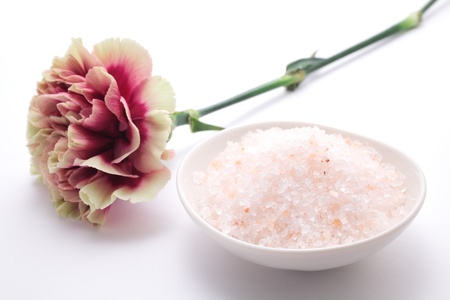 Bath salts with beautiful flowerの写真素材