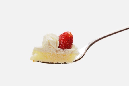 Strawberry shortcake on forkの写真素材