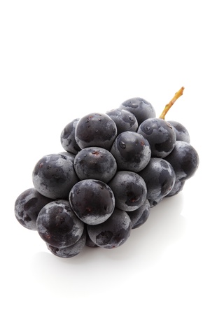 Black Grape isolated on white backgroundの写真素材