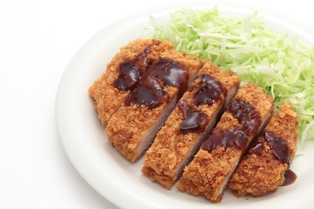 Japanese pork cutlet on white background の写真素材