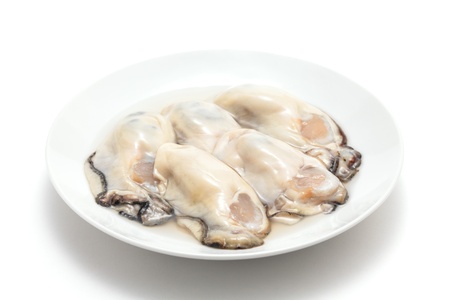 Fresh oysters prepared for cookingの写真素材