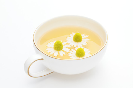 Chamomile tea on white backgroundの写真素材