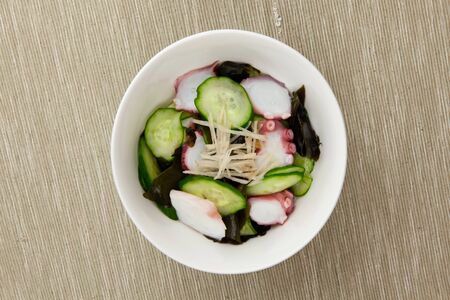 Sunomono, vinegared octopus, cucumber and wakameの写真素材