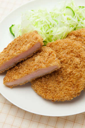 Ham cutlet on a plateの写真素材