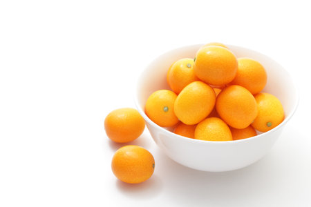 Kumquats on white backgroundの写真素材
