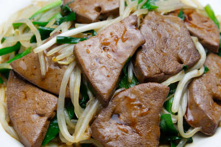 Sauteed liver and garlic chivesの写真素材