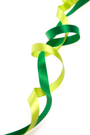 Green and yellow green ribbon on white backgroundの写真素材